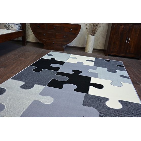 Dětský koberec Puzzle šedý