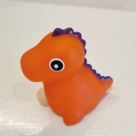 Sada měnící barvu knížka s hračkou - Dinosaurus